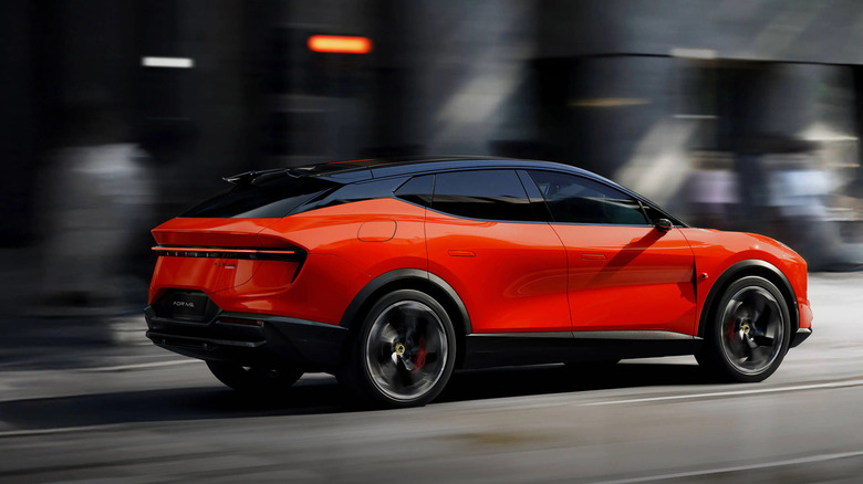 Rear 3/4 view of an orange Lotus For Me