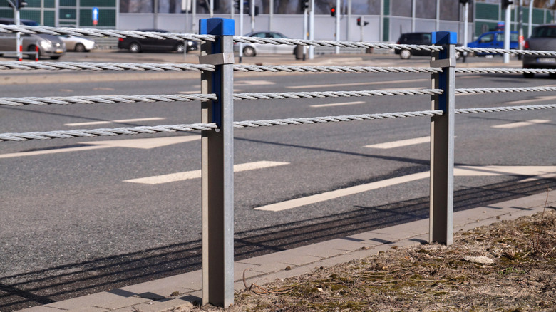 Cable guard rail to protect cars