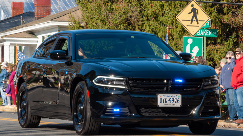 An unmarked Dodge Charger rolls in a parade in Virginia.