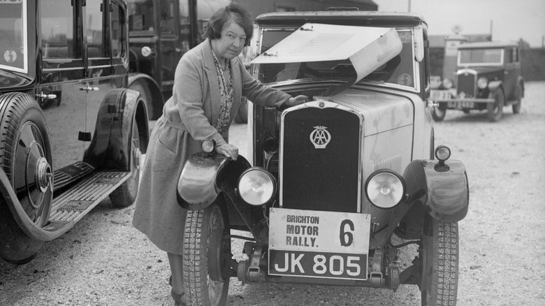 Mrs JW McClintock with her Triumph saloon at the B&HMC Brighton Motor Rally, 1930. Artist: Bill Brunell.