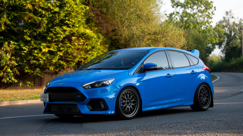 Whittlebury,Northants,UK - August 27th 2022. 2017 blue Ford Focus RS travelling on an English country road