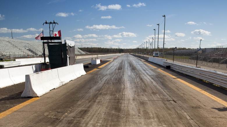 Sport driving race start line with tire tracks