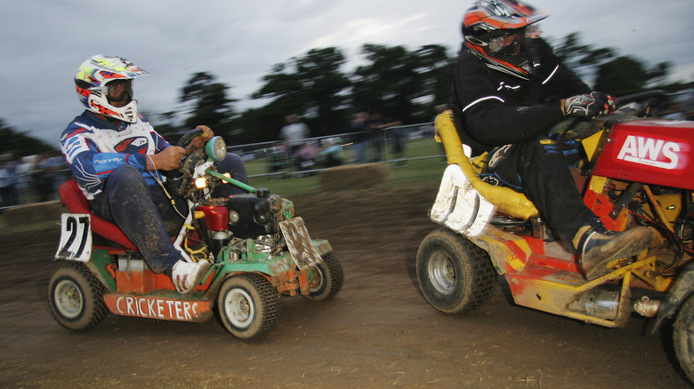 Competition is fierce as lawnmower racing drivers reach speeds of upto around 60mph during the British Lawnmower Racing Society 12 hour endurance meeting on July 29 2006, at Brinsbury College near Billingshurst, West Sussex in England.