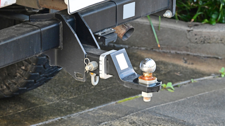 Tow bar and ball on the back of a four wheel drive vehicle