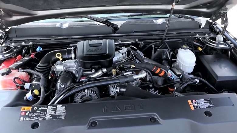 6.6 Duramax LML V8 sitting in the engine bay of a 2013 Chevy Silverado 2500 HD