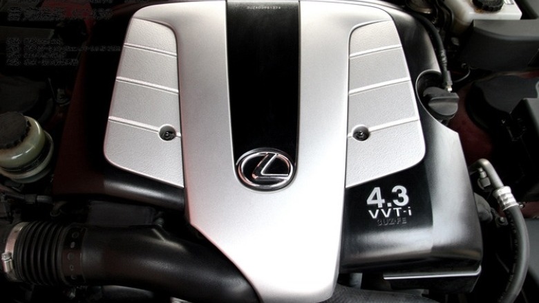 A Toyota 3UZ-FE V8 sitting in the engine bay of a Lexus car