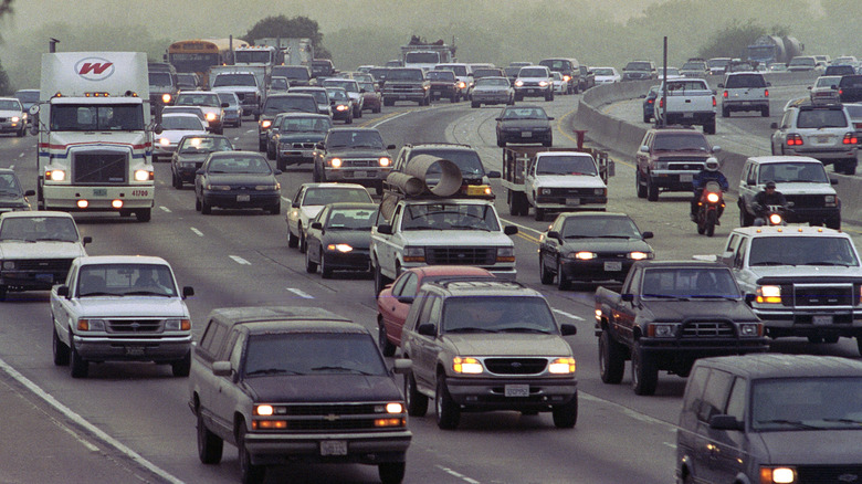 Traffic moves slowly from East to West as early-morning commuters head towards Los Angeles on the Riverside Freeway, May 12, 1999 in Corona, California.