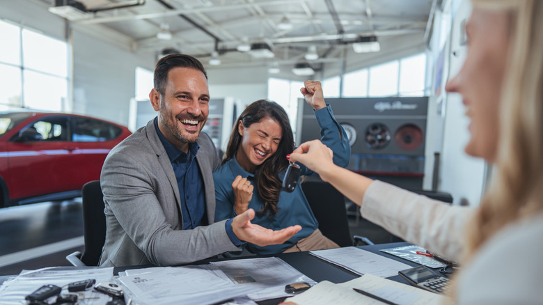 Family buying a car