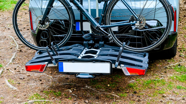 A tow hitch mounted bike rack representing light use