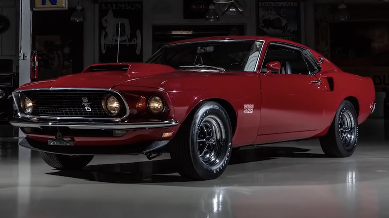 A red 1969 Ford Mustang Boss 429