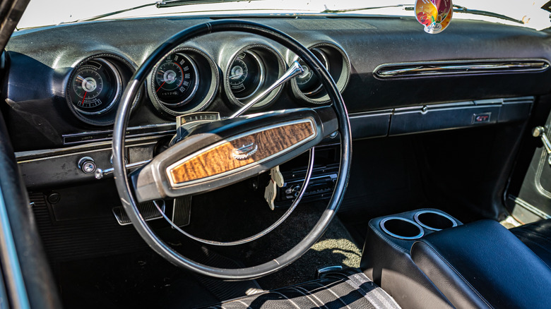 The interior of a 1968 Ford Torino GT with column-shift