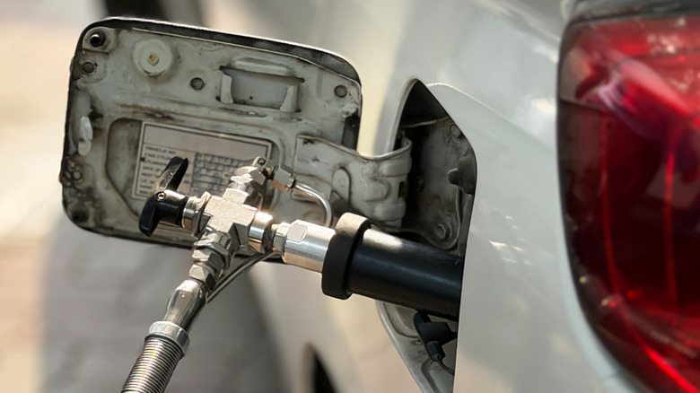 A car being filled up with CNG