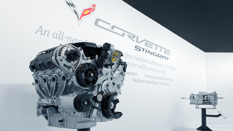 A 2014 Chevrolet Corvette LT2 motor connected a guidelines astatine Chicago Auto Show pinch show transmission successful background