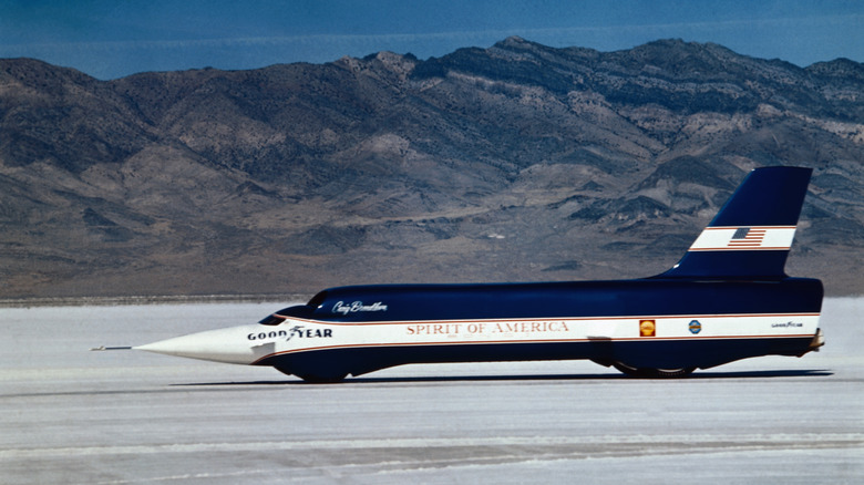Spirit of America is a specially designed racing car in which Craig Breedlove broke the world's ground speed record by reaching a speed of 600.601 miles per hour at the Bonneville Salt Flats Racetrack.