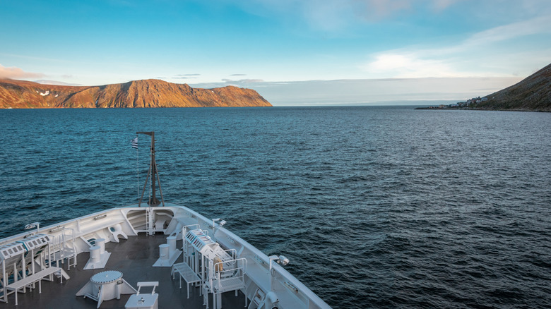 Expedition ship near Big Diomede Island witch other name is Ratmanov Island , Russian Chukotka district on the left and Little Diomede Island on the right,Alaska region USA, Bering strait