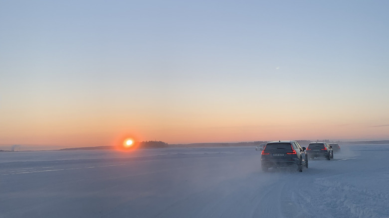 Volvo V60 Cross Country wagons driving on a frozen lake