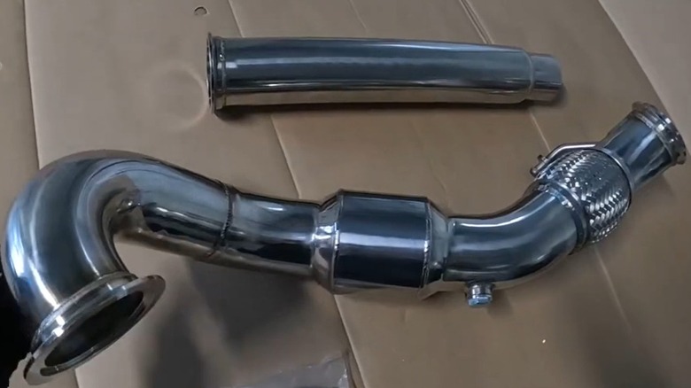 An aftermarket catted downpipe for an Mk7 GTI