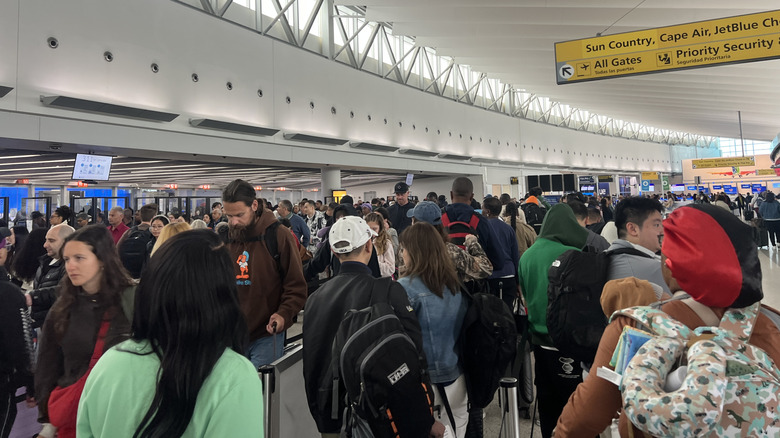 Long TSA security lines are visible at JFK Airport, Queens, New York, April 20, 2026.