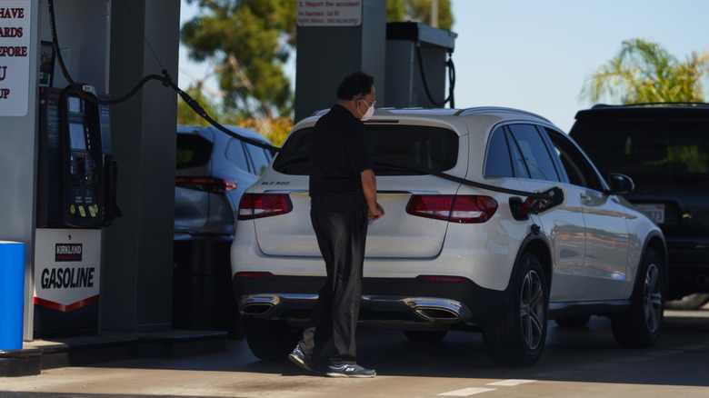 Man pumps gas at a California Costco