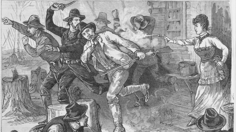 Mrs. Mowery, Mountain Amazon, drives deputies away from her moonshiners' fortress