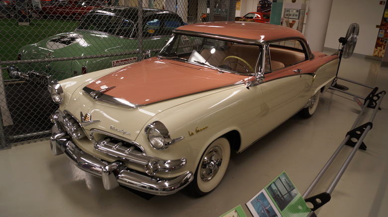 A pink and white dodge le femme