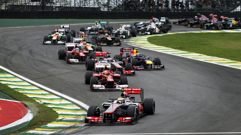 Lewis Hamilton driving his McLaren MP4-27 through the Senna 'S' while leading the Brazilian Grand Prix