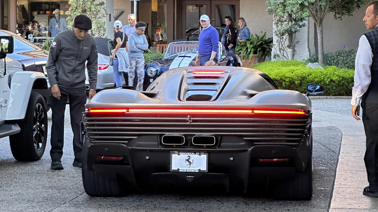 Rear end of a silver Ferrari Daytona SP3