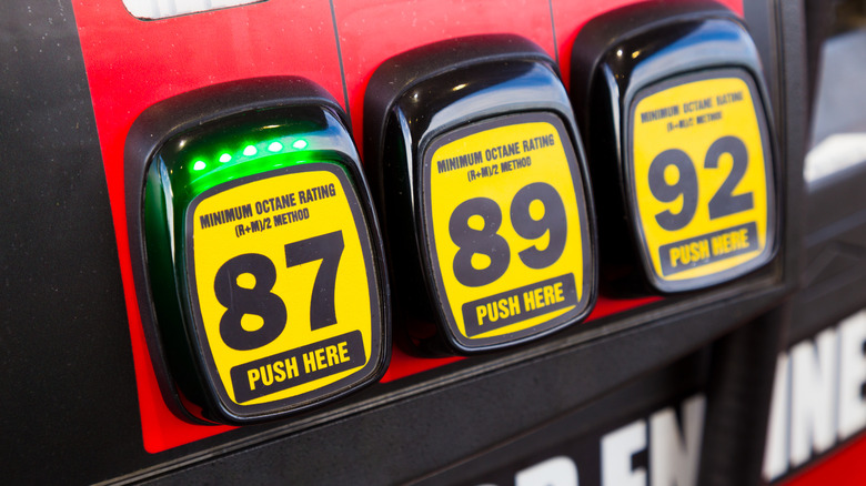 A fuel pump displaying three gas grades with 87 octane illuminated.