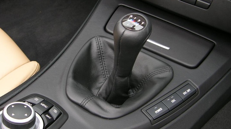 A stick shift in a 2009 BMW M3.