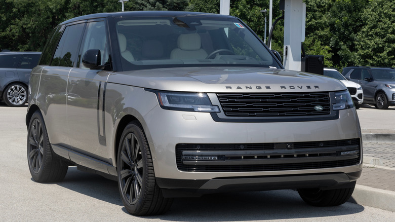 Land Rover Range Rover hybrid sits on a parking lot.