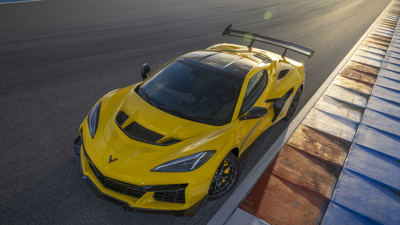 A pre-production Corvette ZR1 coupe in Competition Yellow with optional ZTK Performance Package on the race track