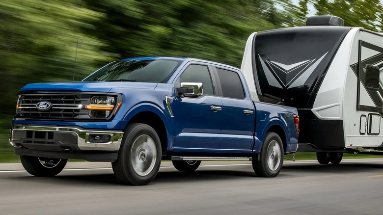 2025 Ford F-150 towing a travel trailer