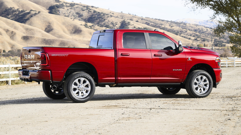 2025 Ram 2500 Heavy Duty Laramie parked on a dirt surface with hills in the background