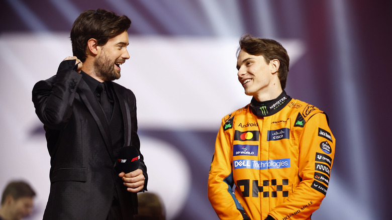 Jack Whitehall chats with Oscar Piastri of Australia and McLaren on stage during F1 75 Live at The O2 Arena on February 18, 2025 in London, England.
