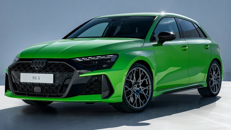 A 2024 Audi RS 3 Sportback in green on display