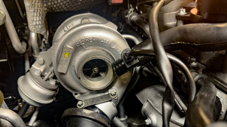 A turbocharger installed in a modern car engine