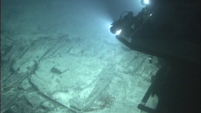 A submersible vessel shines a light on a shipwreck discovered off the coast of Norway in 2003 during construction of the Ormen Lange pipeline.