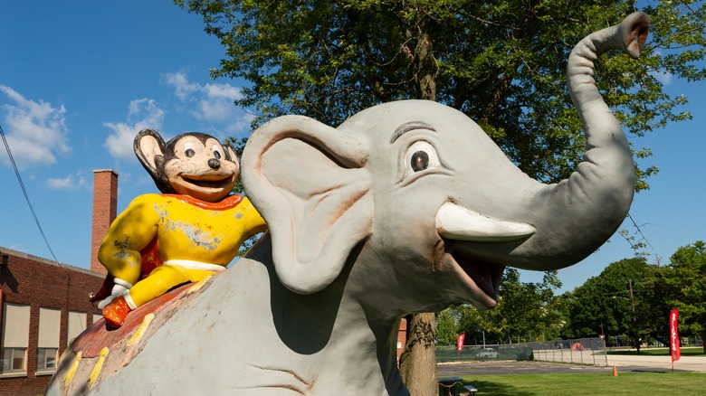 Mighty Mouse rides the back of an elephant