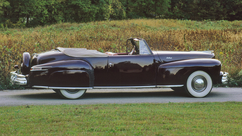 A 1948 Lincoln Continental on a country road.
