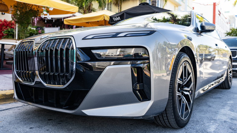 BMW i7 EV luxury sedan parked outside on a street