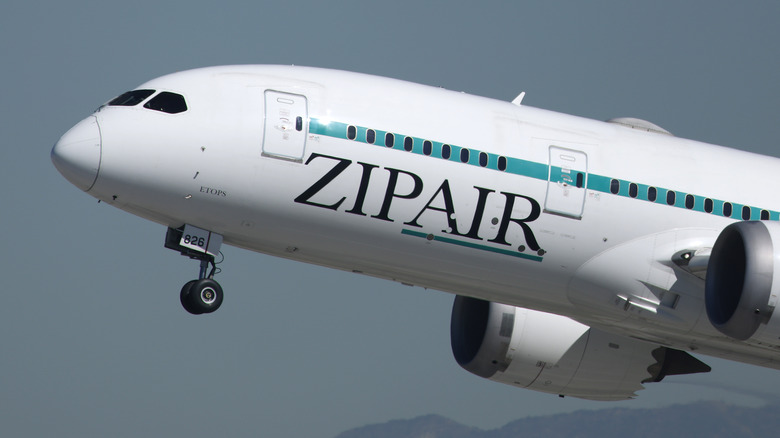 A Zipair Boeing 787-8 Dreamliner departs from Los Angeles International Airport