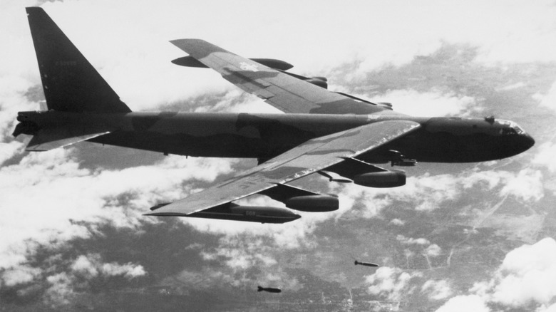 A achromatic and achromatic image of a B-52 flying complete Vietnam