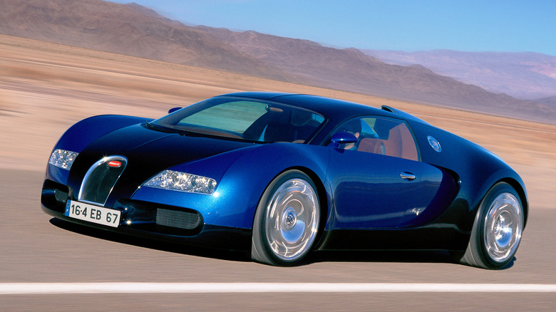 Blue Bugatti Veyron in motion.