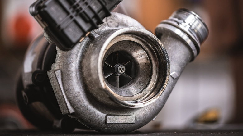 a closeup photo of a turbocharger