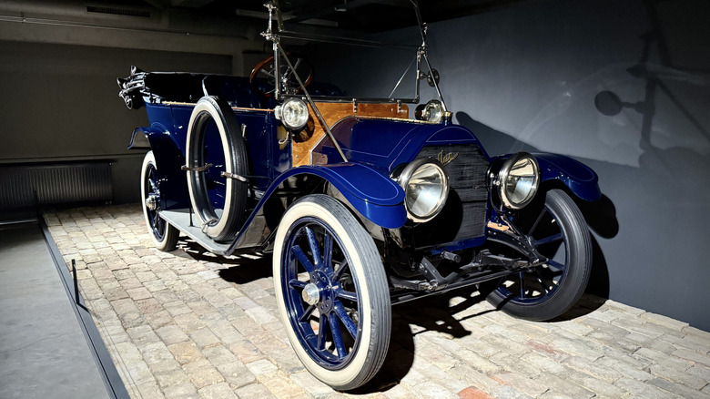 A 1912 Cadillac Model 30 parked in a museum.
