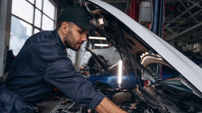 Mechanic working on a car