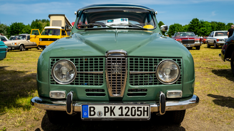1967 Saab 96 on display at a car show
