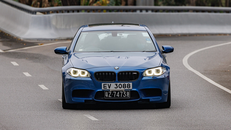 An Estoril Blue F10 BMW M5, another victim of the 155 mph limit.