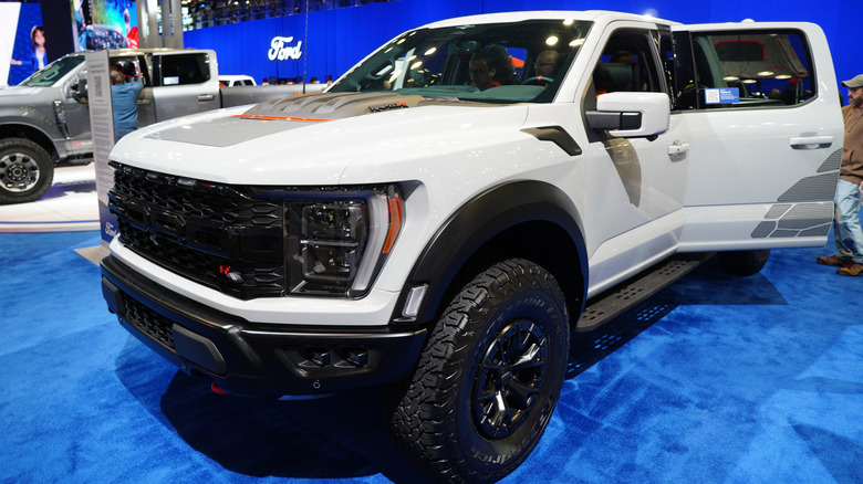 A white Ford Raptor R parked at an auto show.