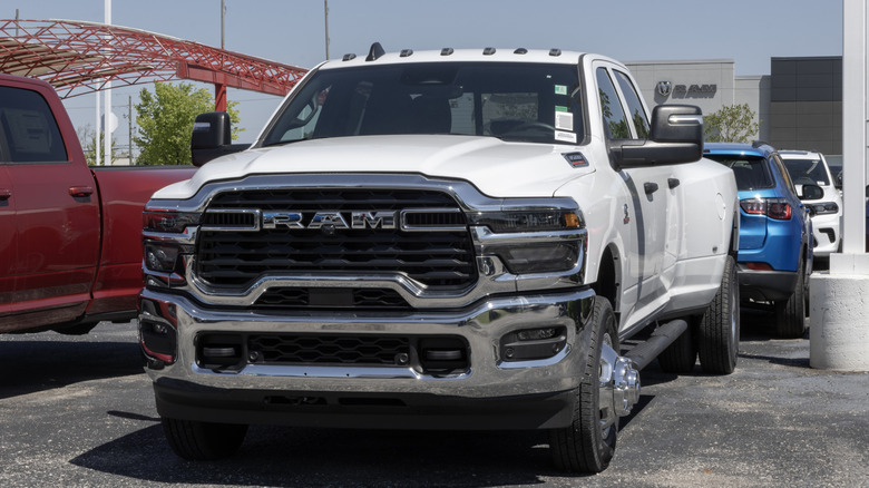 A Ram 3500 Tradesman Crew Cab 4X4 Long Box with a 6.7L Cummins diesel engine.
